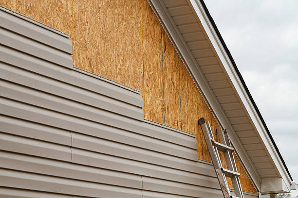 Professional Emergency Siding Repair technician working in Pleasant Hall, PA